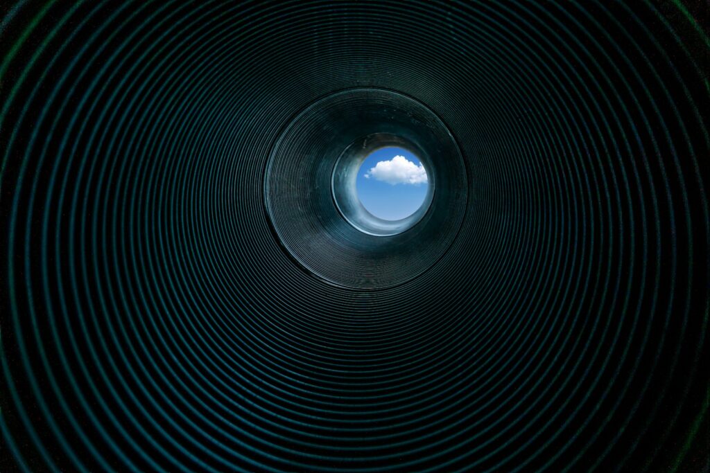 low angle photography of tube interior